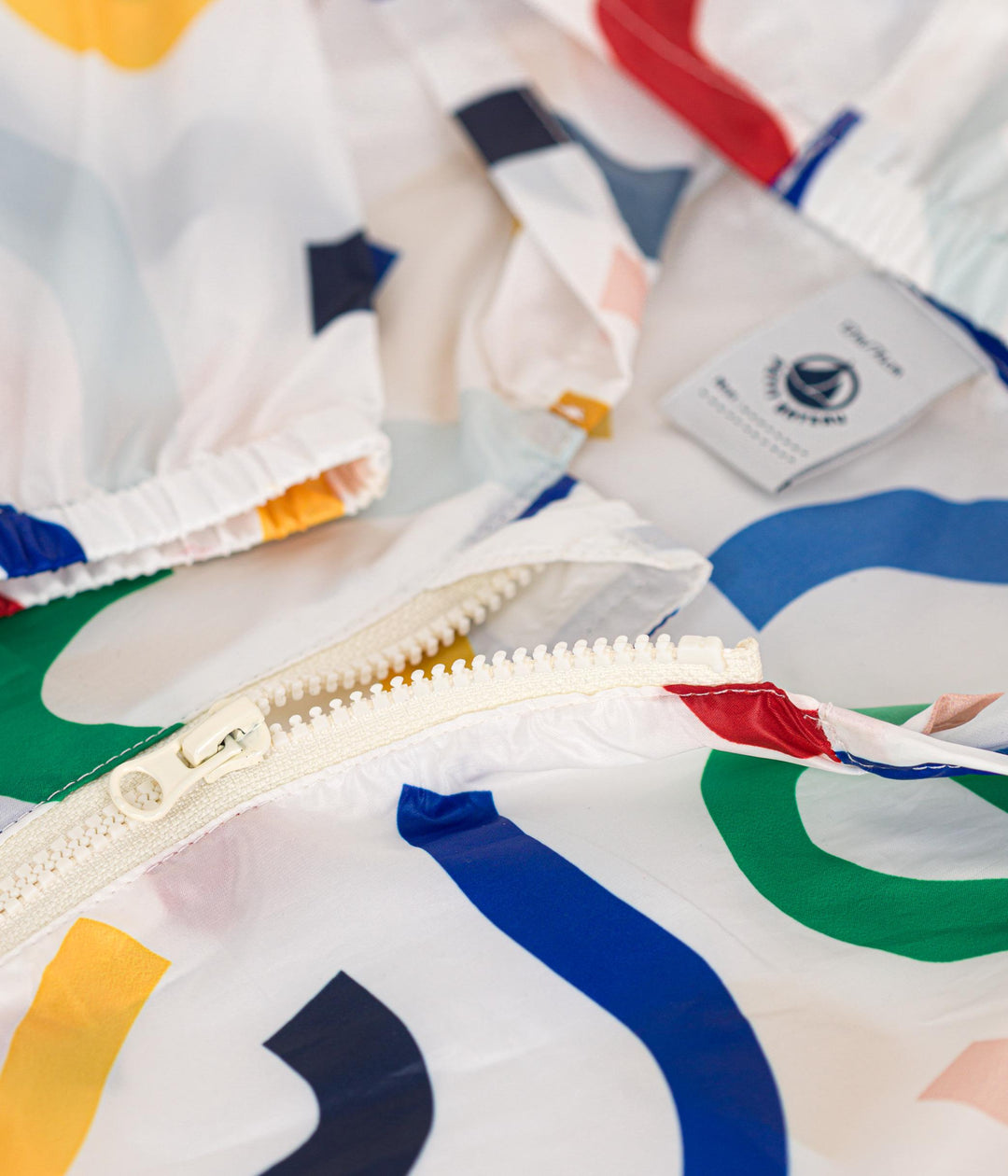 GIACCA A VENTO BEBÈ ANTI-UV IN POLIESTERE RICICLATO A09JG 10 PETIT BATEAU 