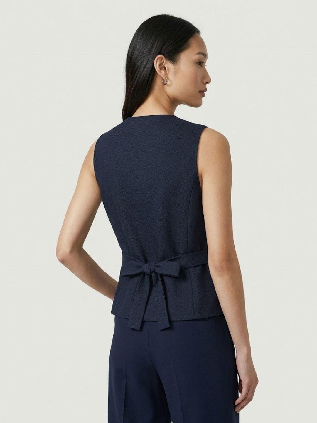 Gilet con fiocco posteriore navy ISOTTA BLU ANDREA MORANDO 