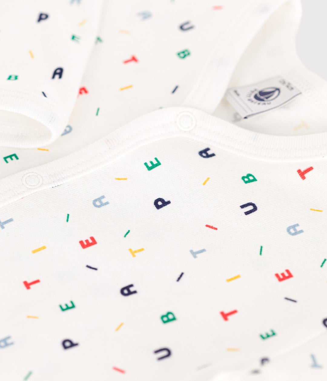 Tutina fantasia lettere senza piedini A0BUP 01 PETIT BATEAU 