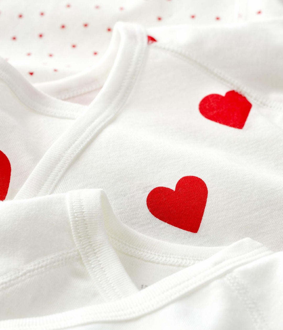 CONFEZIONE DA 3 BODY INCROCIATI IN COTONE CON MOTIVO A CUORE A04O7 00 PETIT BATEAU 